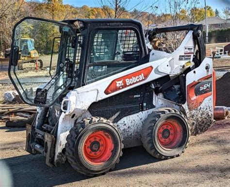 how many hours is a lot on skid steer|what does a bobcat cost.